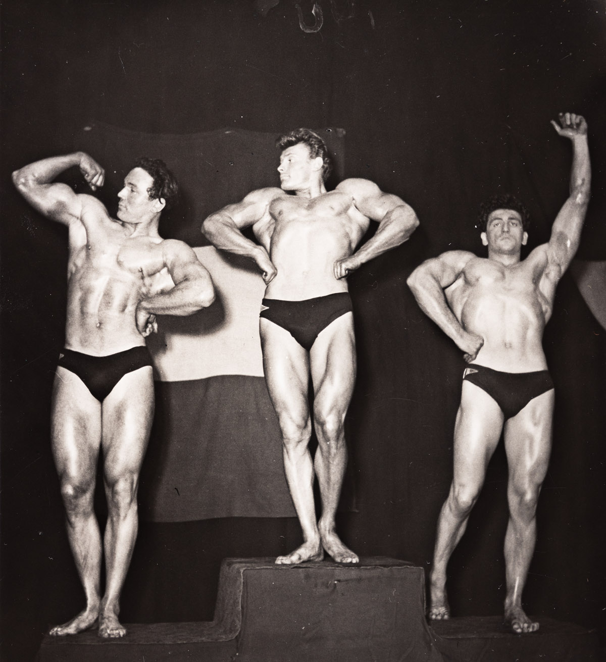 (BODYBUILDING) A bound volume with 105 photographs from Studio Arax centered on bodybuilders.